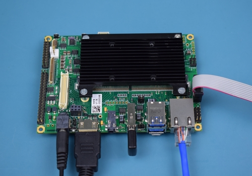 HDMI, Ethernet, USB keyboard and power supply connected to the Ixora Carrier Board