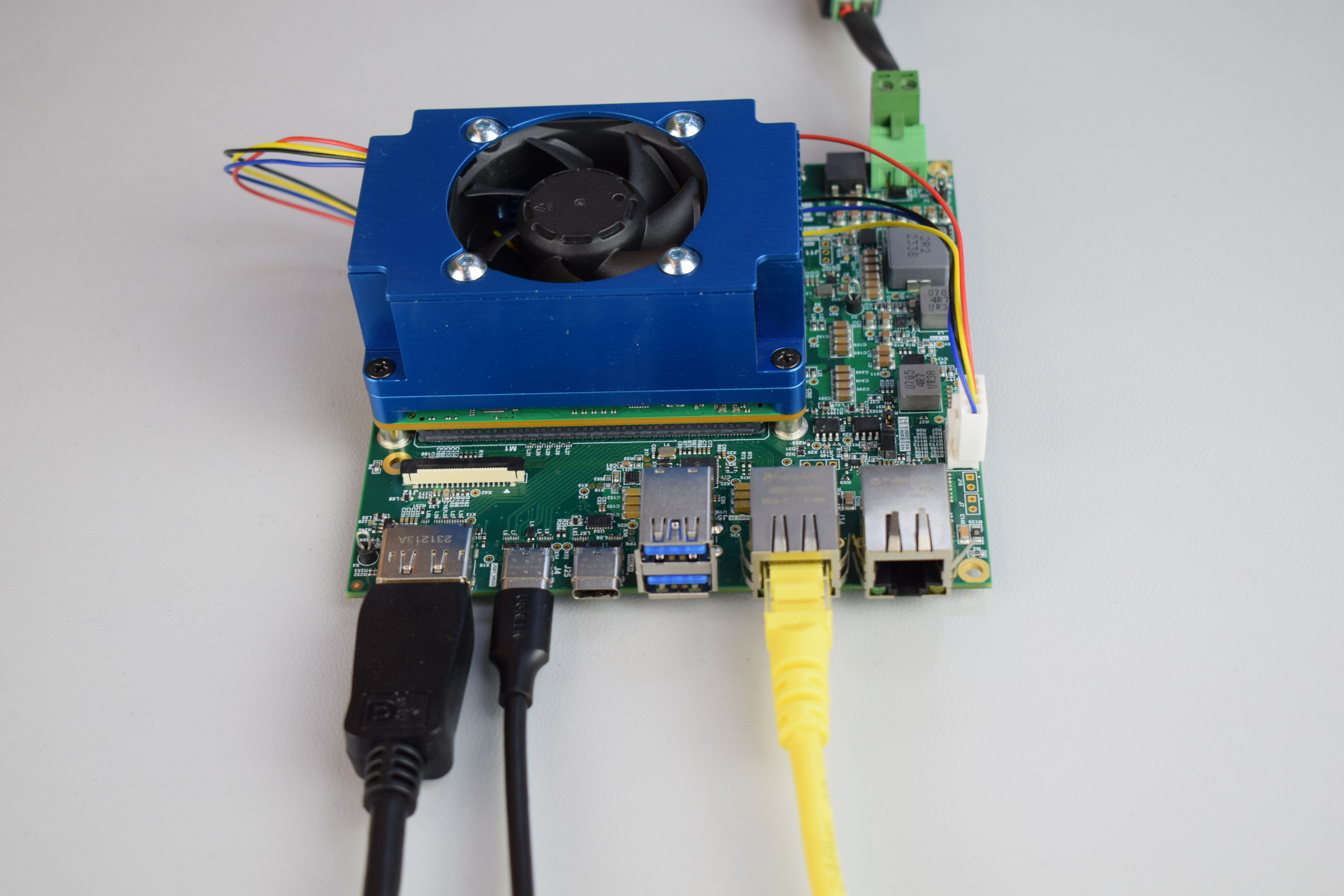 DVI-D, Ethernet, USB keyboard, power supply and USB Type-B to Type-A cables connected to the Evaluation Board